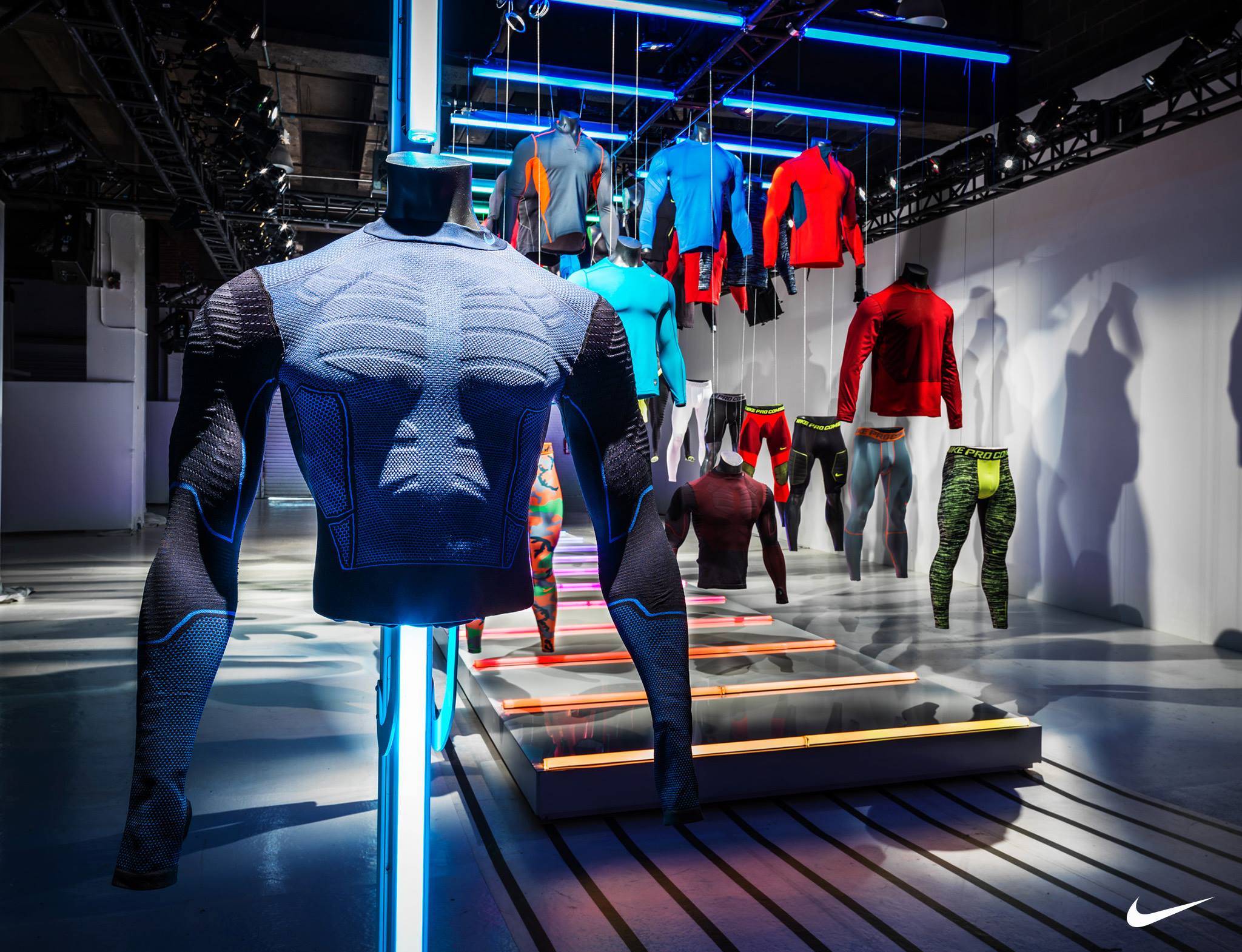 Nike Pro apparel installation showing suspended performance baselayers in the Nike Sport Research Lab